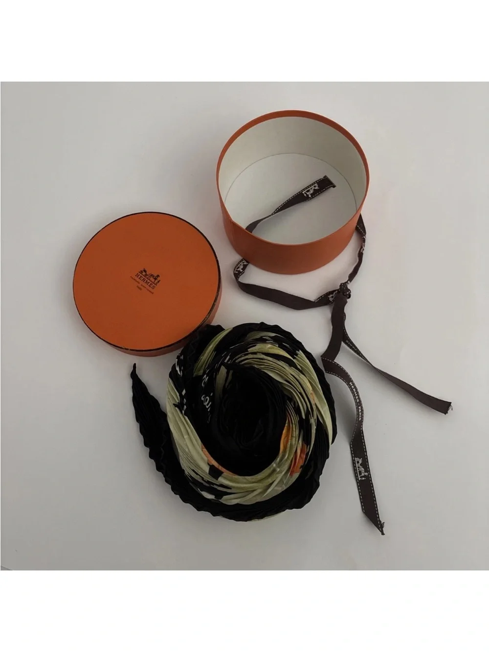 Hermes Plisse Les Capucines Black Scarf with Green Leaf & Orange Floral Print